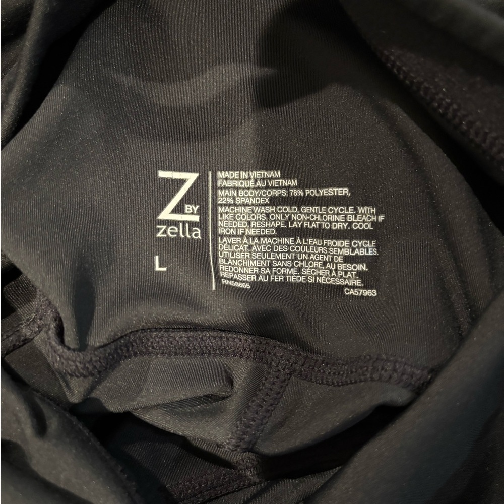 Zella Black Performance body suit flare leg